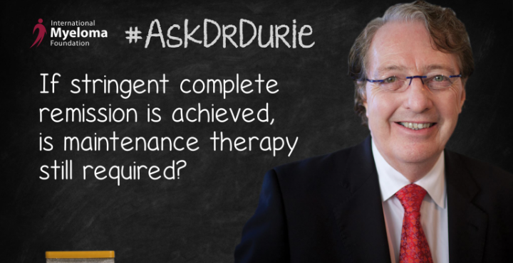 Dr. Durie in front of chalk board