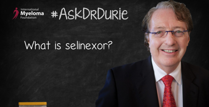 Dr. Brian Durie in front of a chalk board