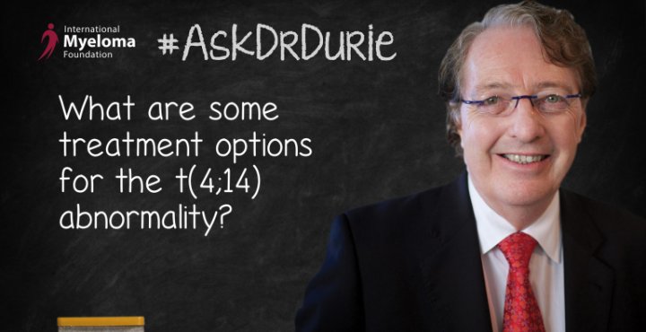 Dr. Durie in for of a chalk board