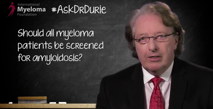 Dr. Brian G.M. Durie photo on backdrop of chalkboard with text overlay, "Should all myeloma patients be screened for amyloidosis?"