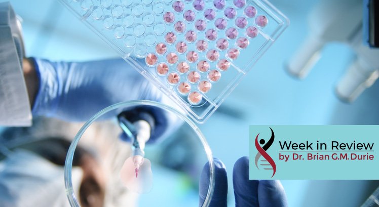 lab technician getting blood samples in pipettes in a lab setting