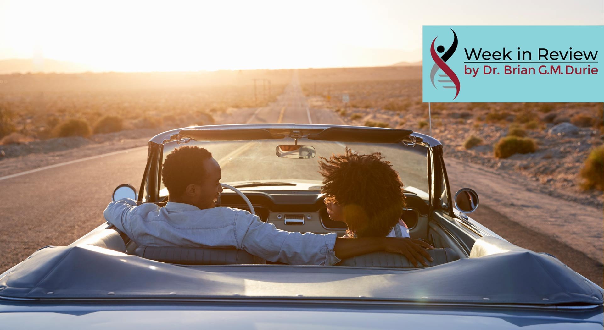 blog couple driving into sunset
