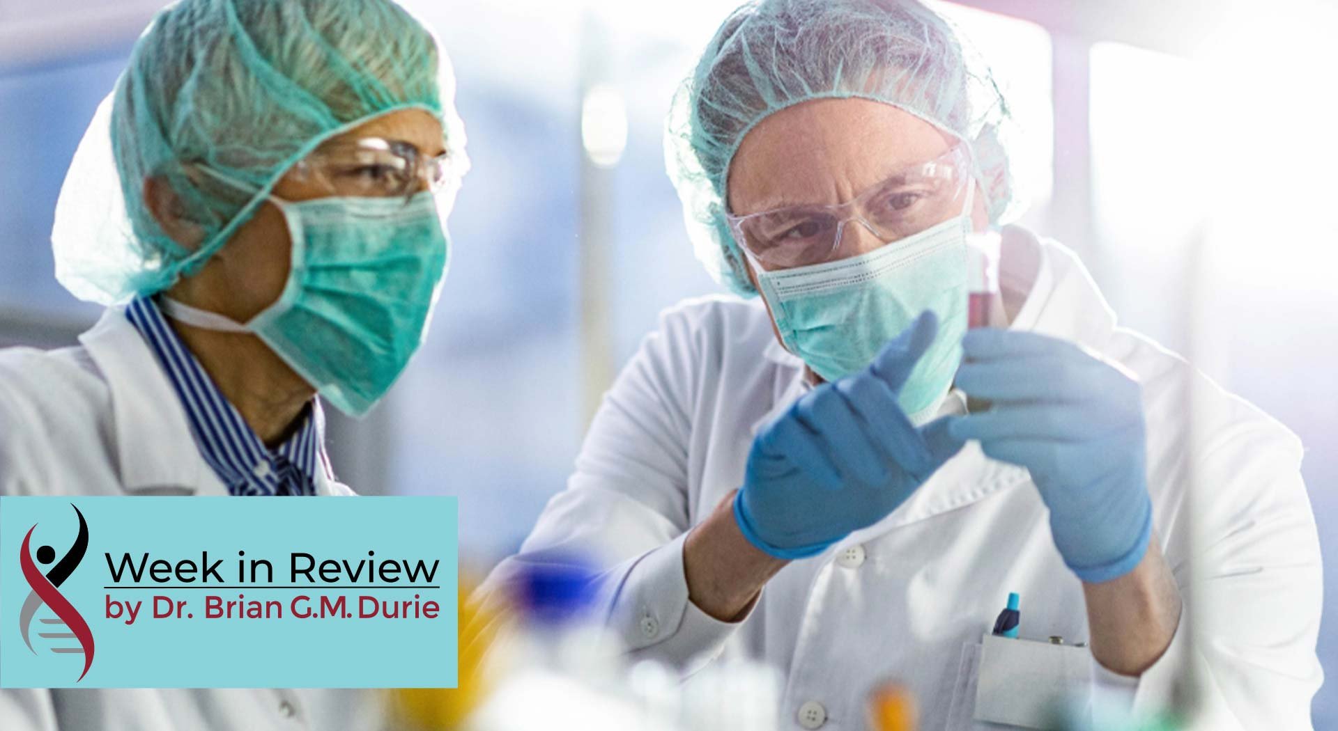 two masked researchers in a lab