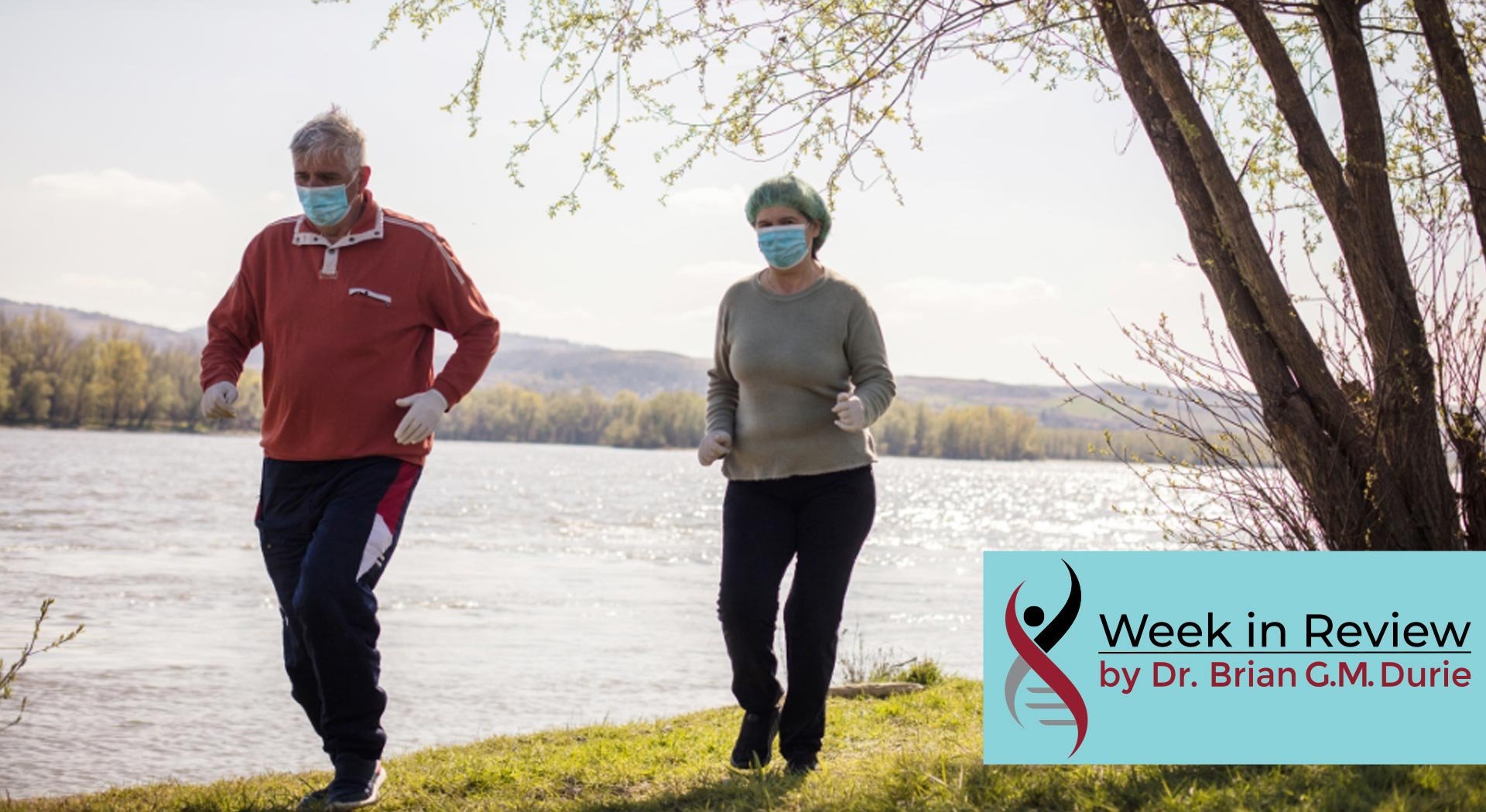 senior couple walking in masks