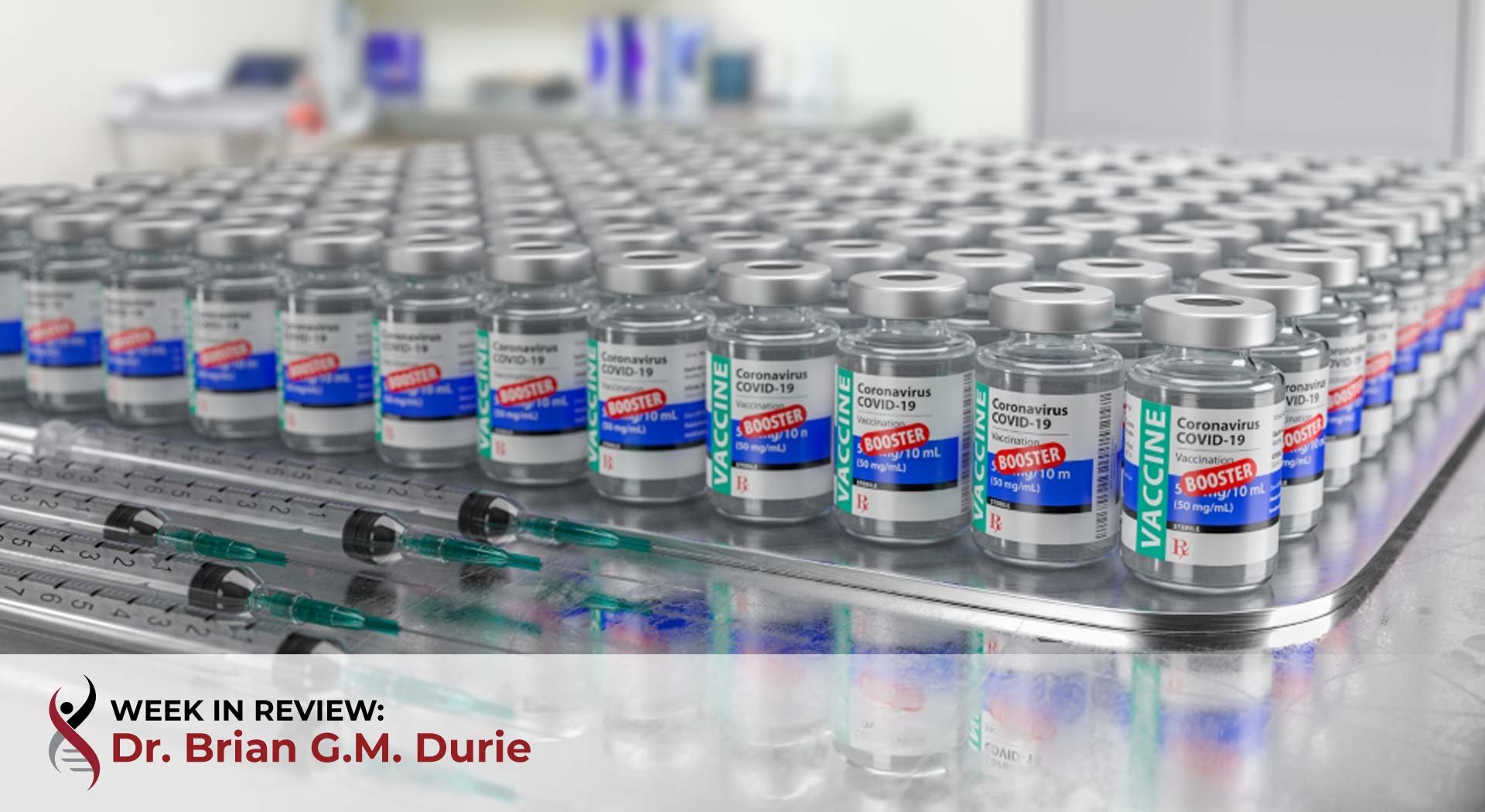 multiple covid 19 vaccine booster vials on table