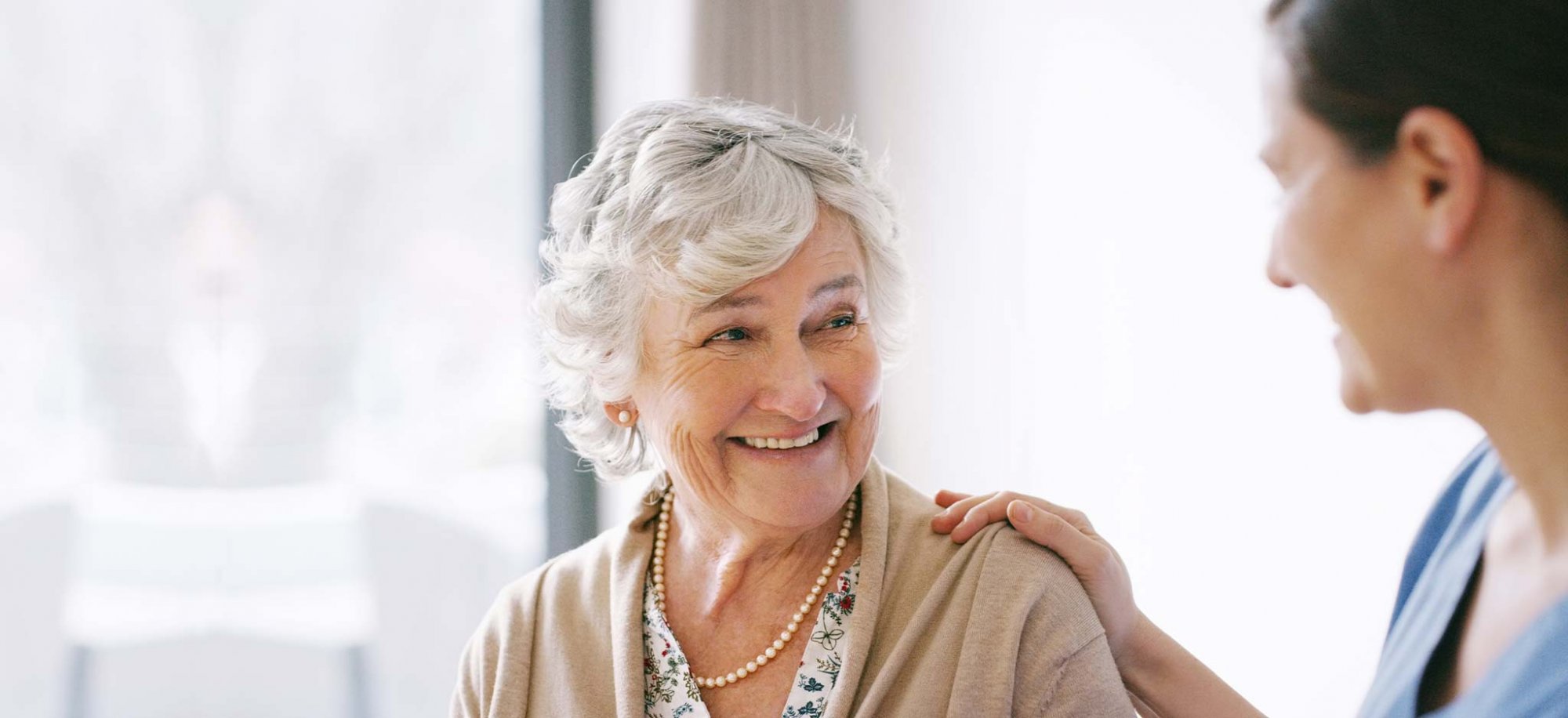 senior woman cared for by healthcare worker