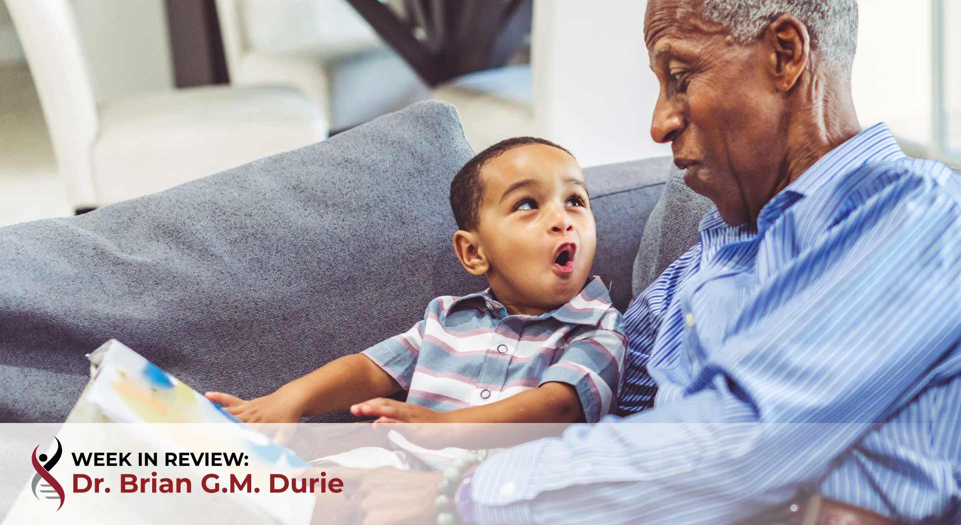Grandfather reads to his grandson