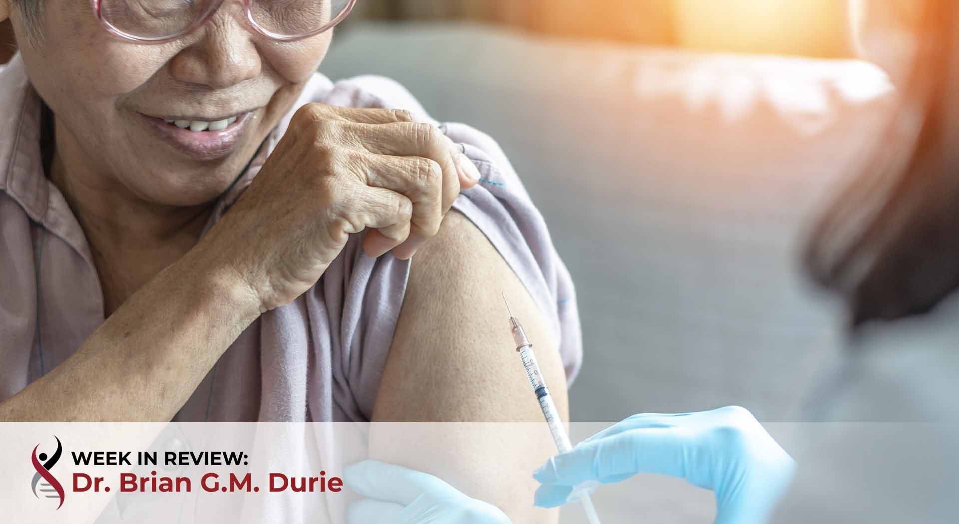 elderly Asian woman getting vaccinated