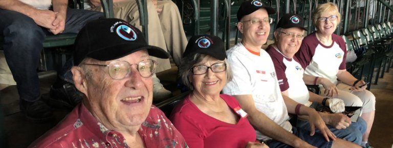 support group warriors watching baseball game