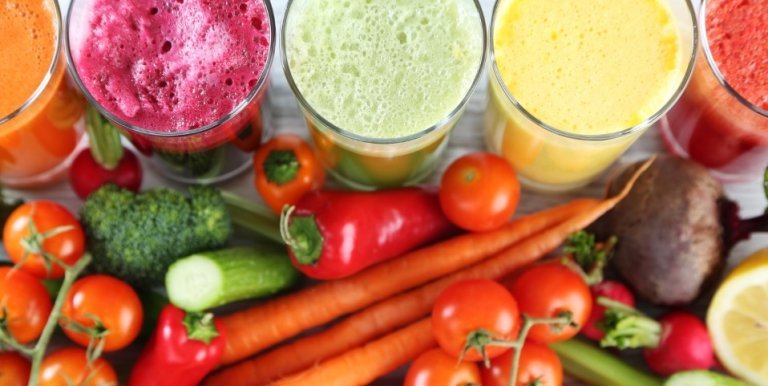 An assortment of vegetables and vegetable juices