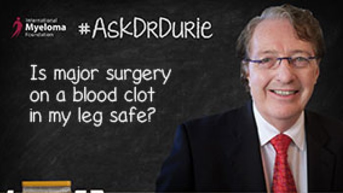 Dr. Durie in front of a chalk board