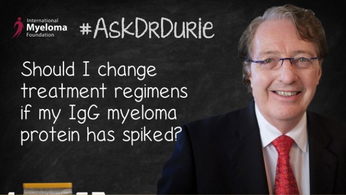 Dr. Durie in front of a chalkboard