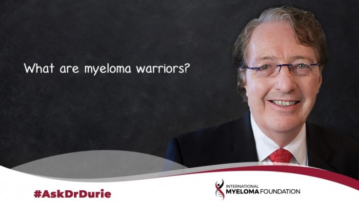 Video still of Dr. Brian G.M. Durie with chalkboard backdrop and text overlay: What are myeloma warriors?