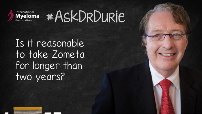 Video still of Dr. Brian G.M. Durie on chalkboard backdrop with text overlay: Is it reasonable to take Zometa for longer than two years?