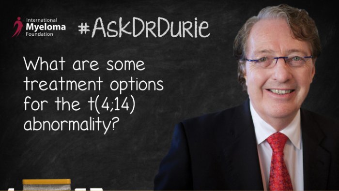 Dr. Durie in for of a chalk board